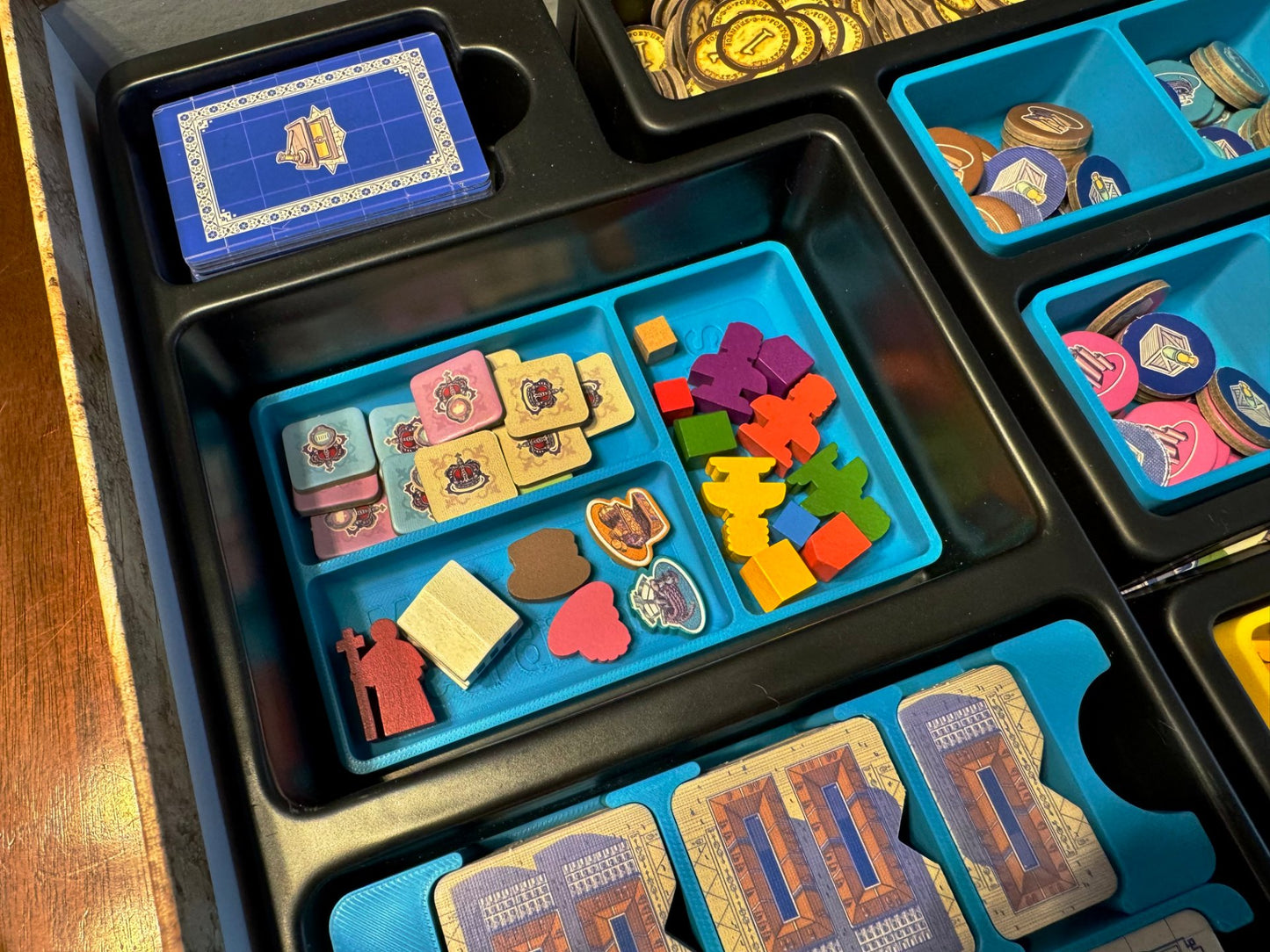 KreativLayers Lisboa Deluxe Board Game Organizer with compartments for game pieces and cards.