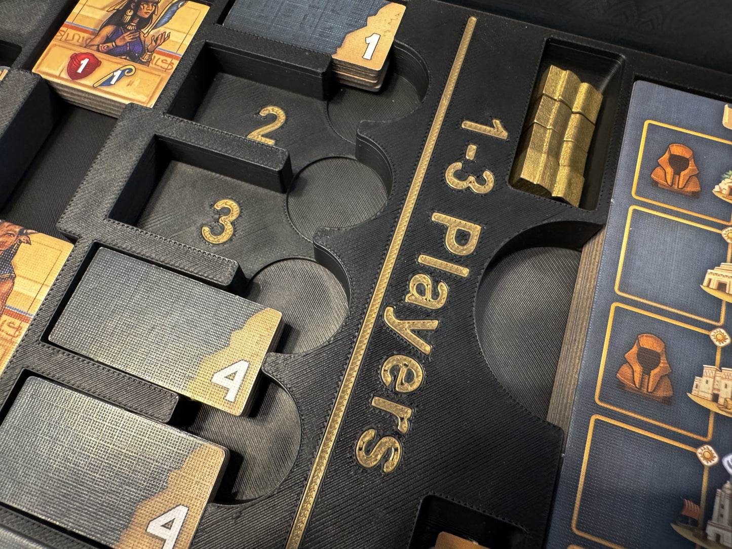Men-Nefer board game organizer by KreativLayers, featuring custom compartments for game components and cards.