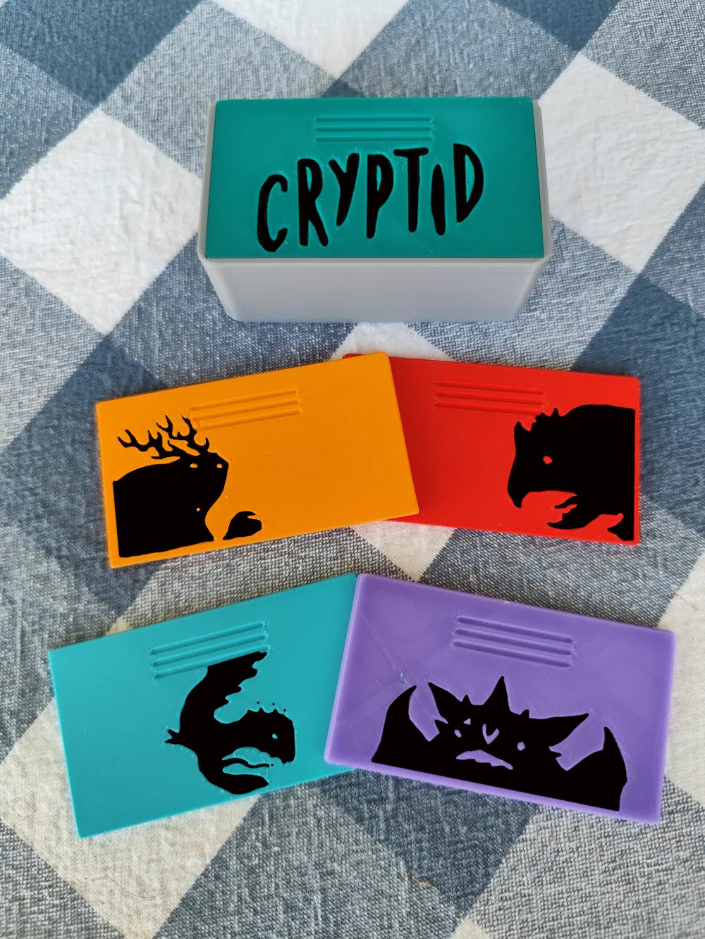 Cryptid INSERT board game organizer by KreativLayers with compartments for game pieces and cards, designed for easy storage.