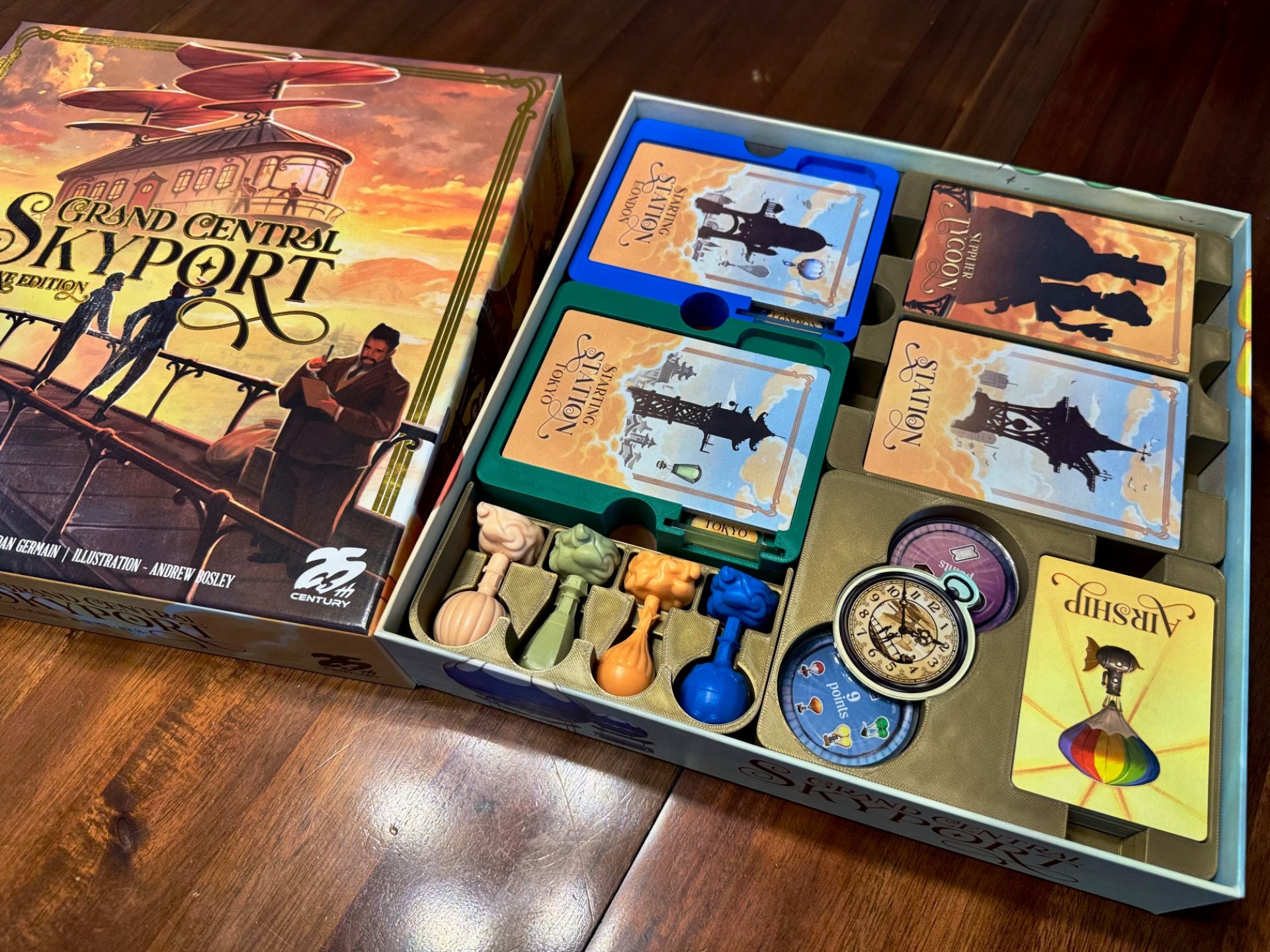 Grand Central Skyport Deluxe Insert by KreativLayers, featuring compartments for organized board game storage.