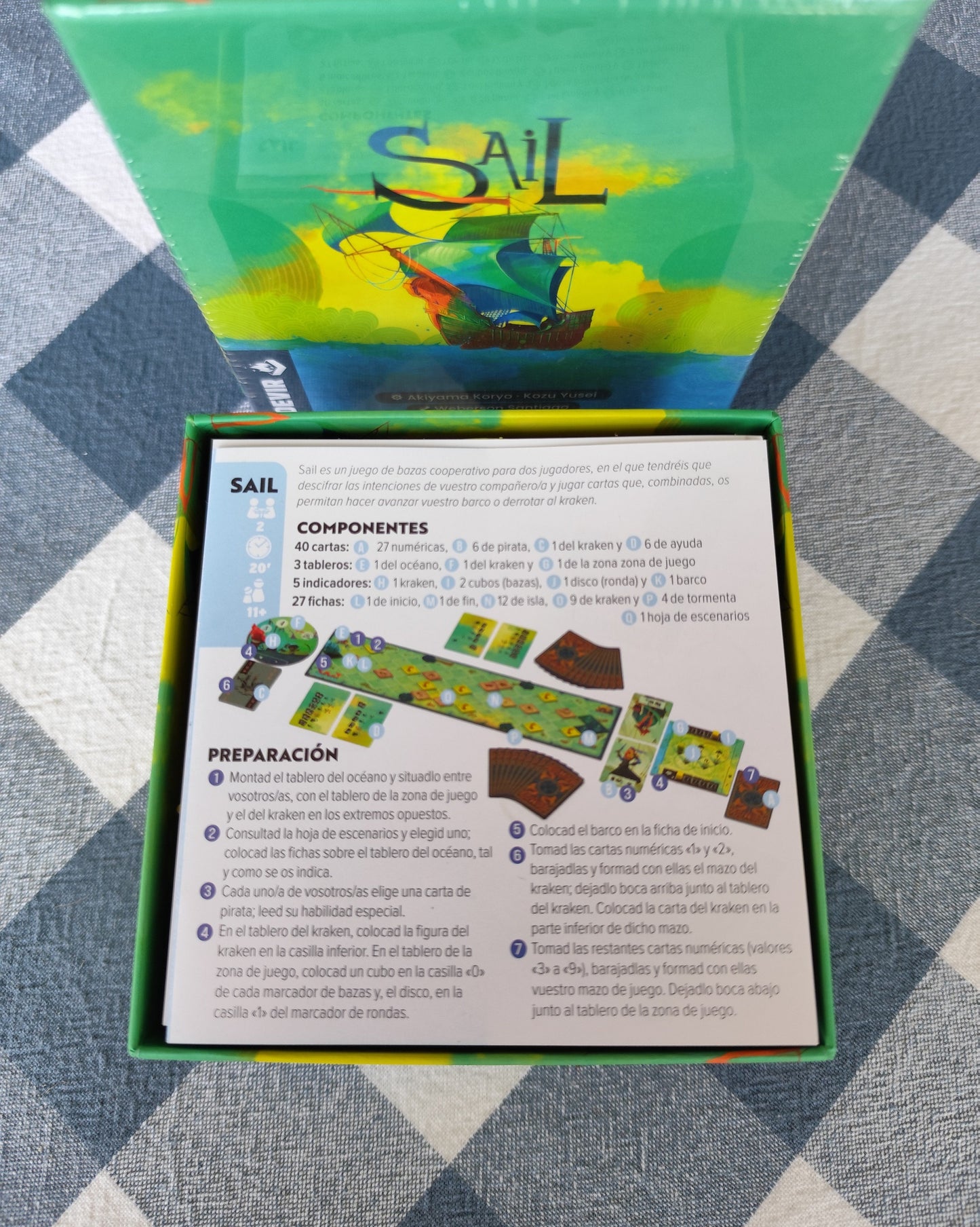 Sail board game organizer by KreativLayers, showcasing compartments for cards, tokens, and game pieces in a neat layout.
