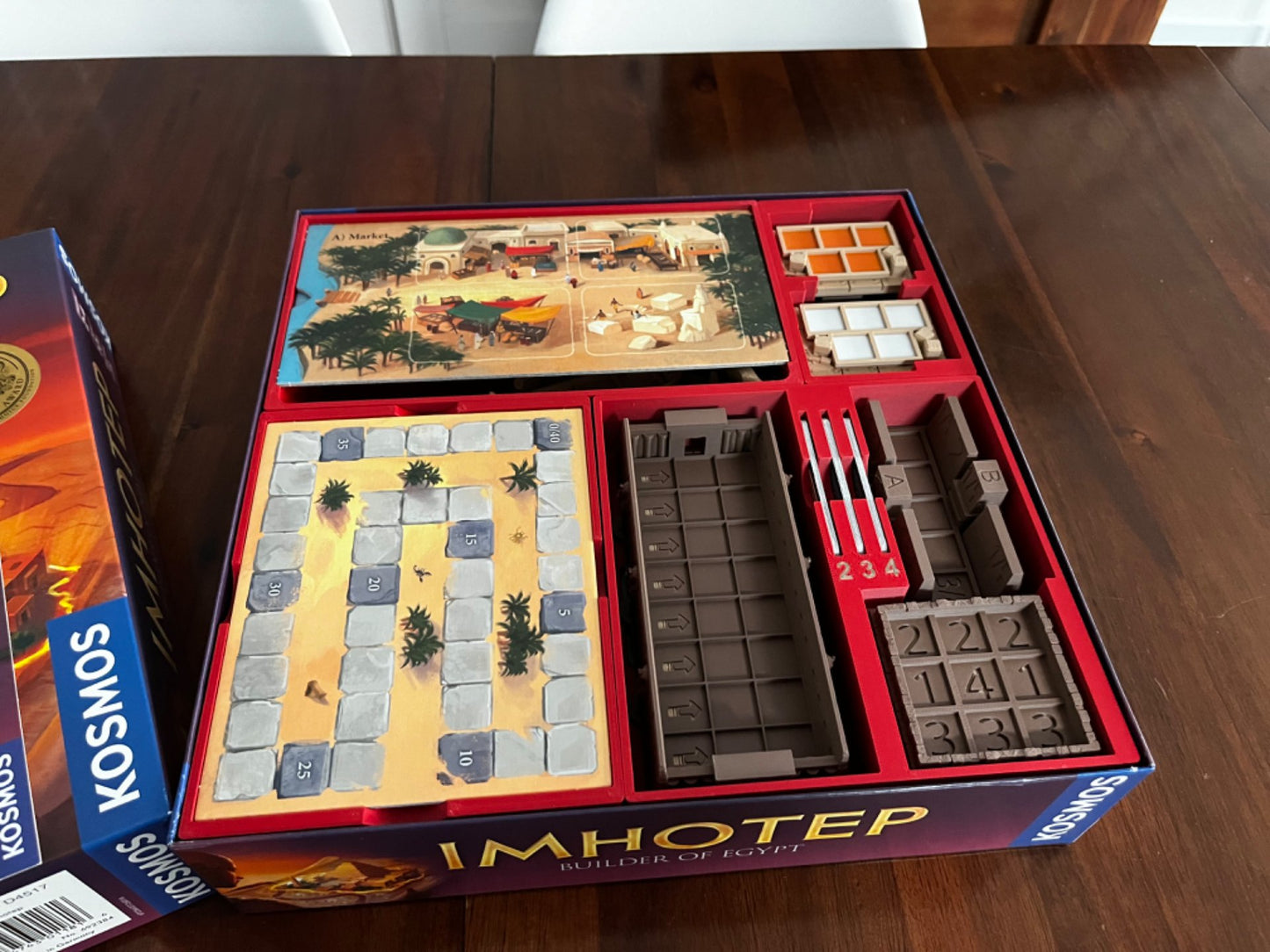 Imhotep Insert by KreativLayers featuring upgraded components for organizing board game pieces and accessories.