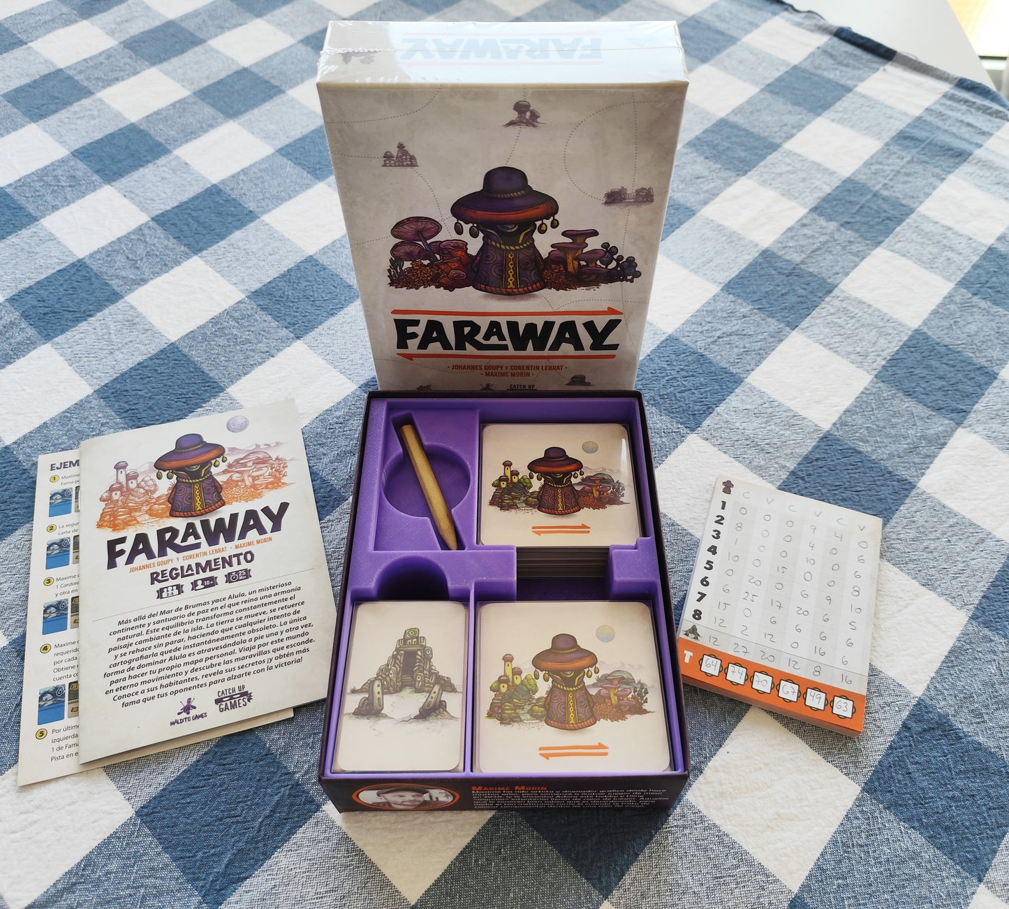 KreativLayers Faraway board game organizer with compartments for game pieces and cards, showcasing a sleek design.