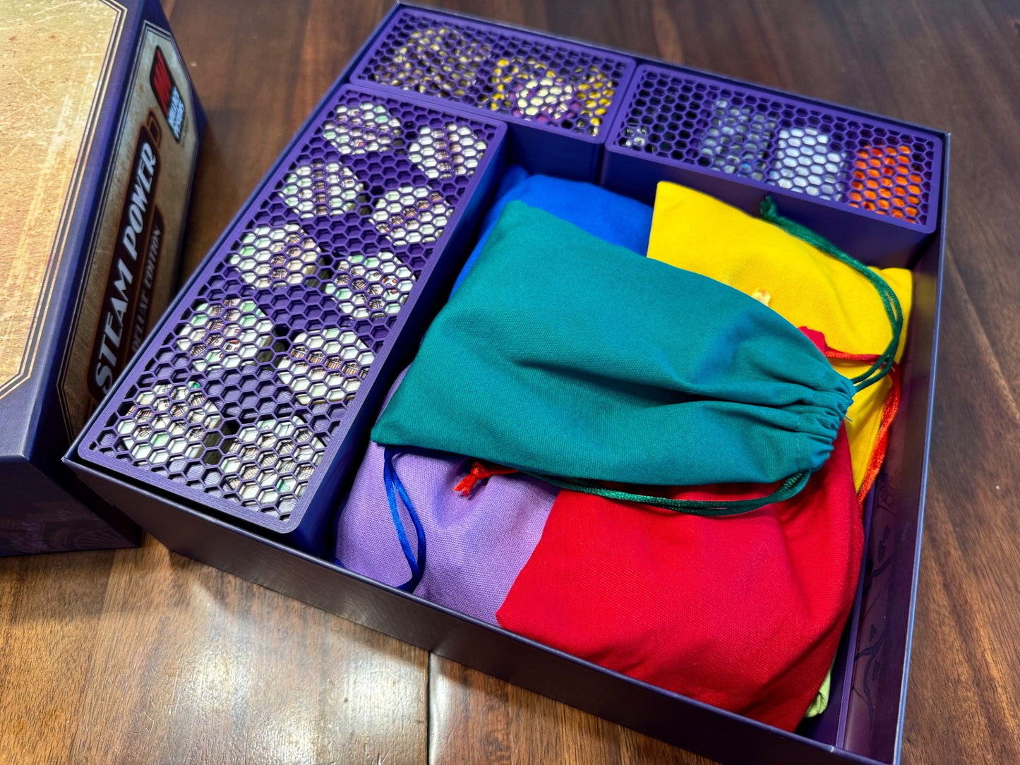 Steam Power Deluxe Insert by KreativLayers, a wooden board game organizer designed for efficient storage and game play.