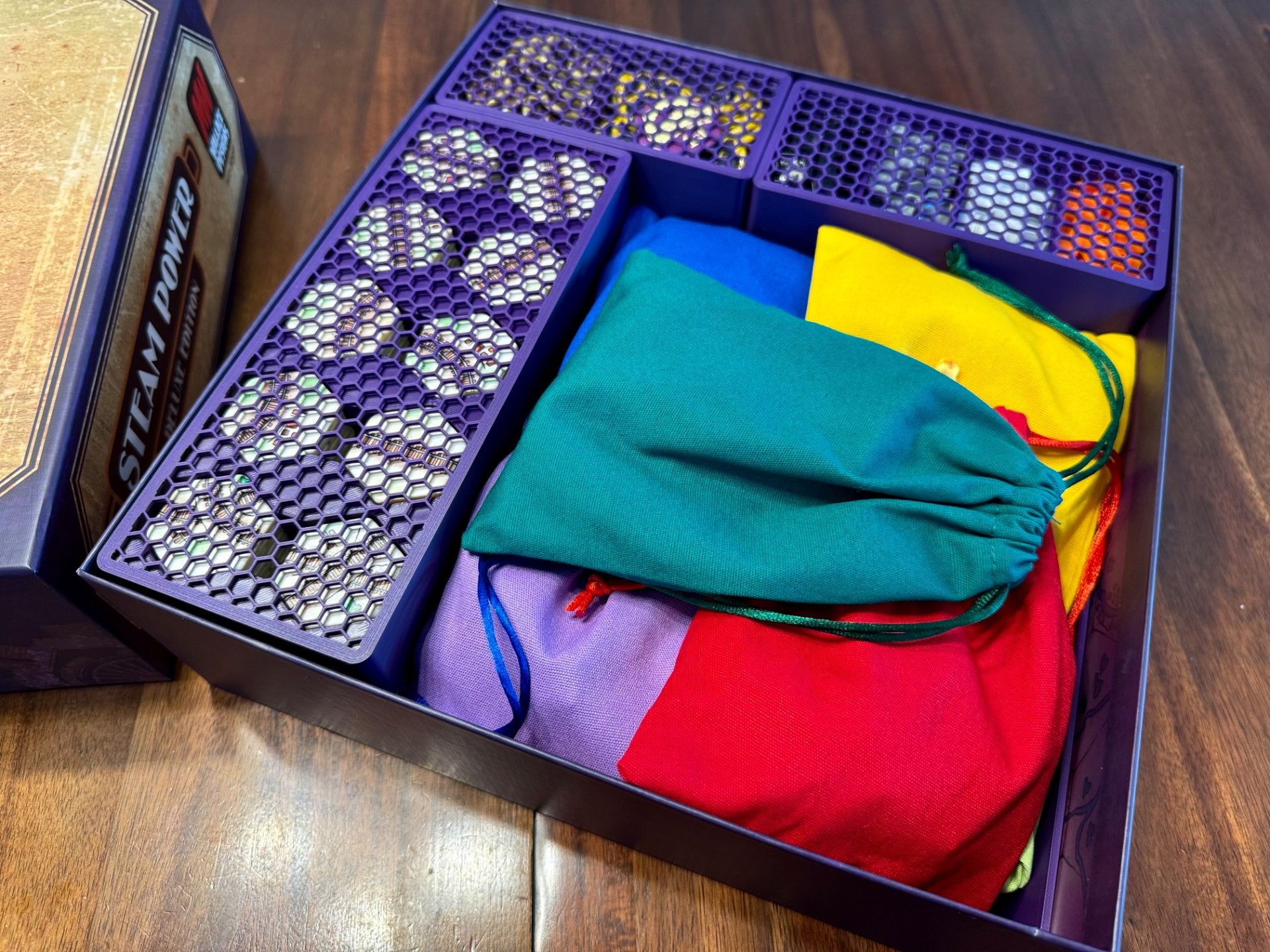 Steam Power Deluxe Insert by KreativLayers, a wooden board game organizer designed for efficient storage and game play.