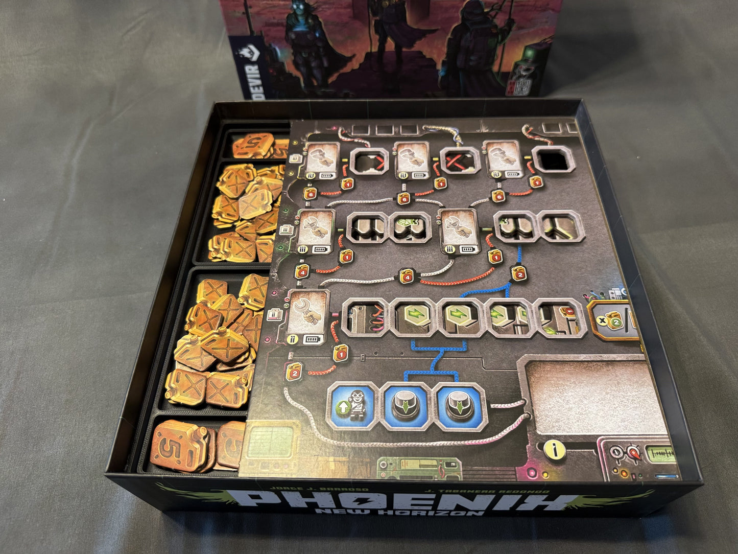 KreativLayers Phoenix New Horizon board game organizer with compartments for tokens and cards, featuring a sleek design.