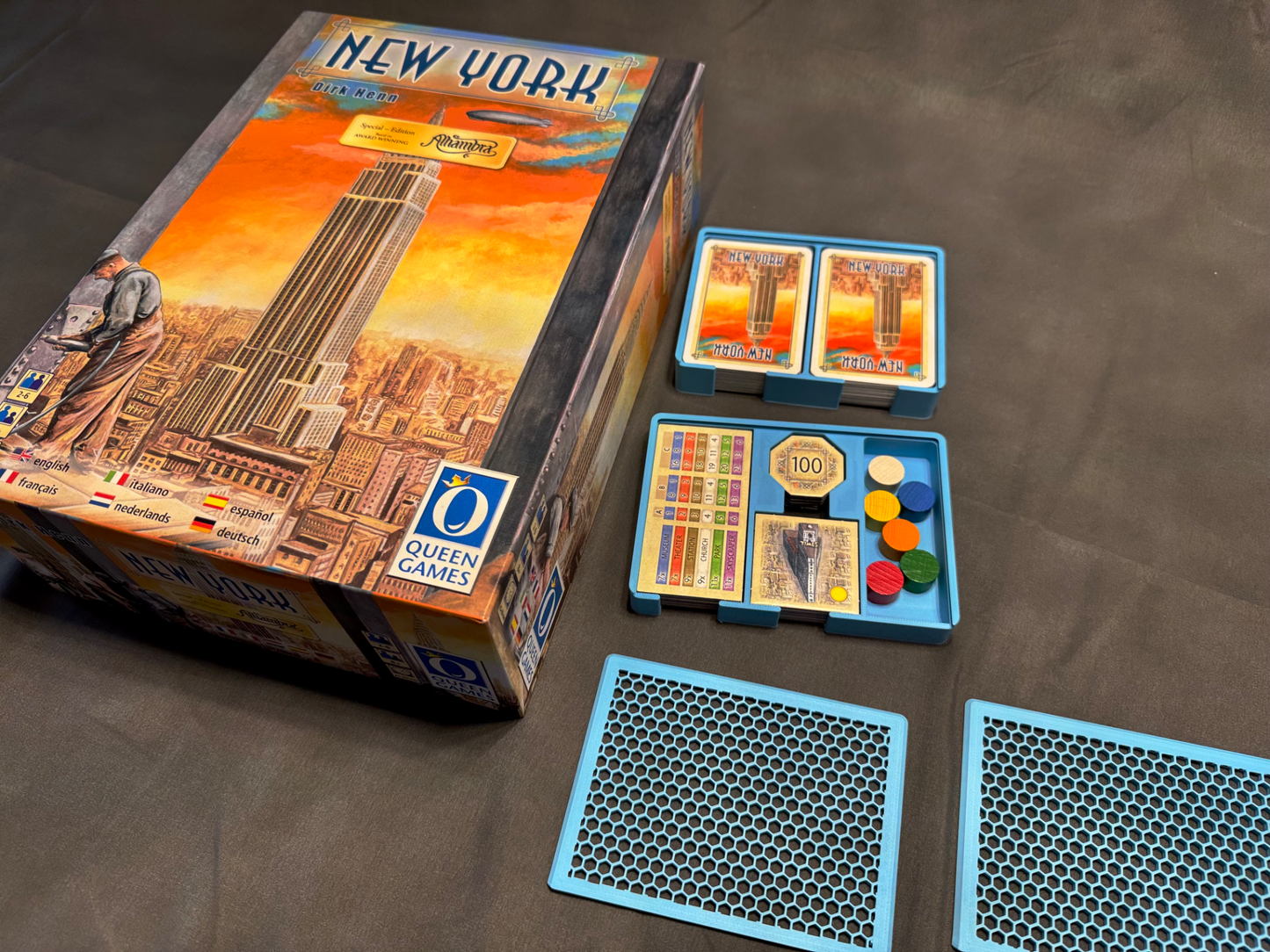 KreativLayers New York board game organizer with compartments for game pieces and cards, showcasing a functional design.