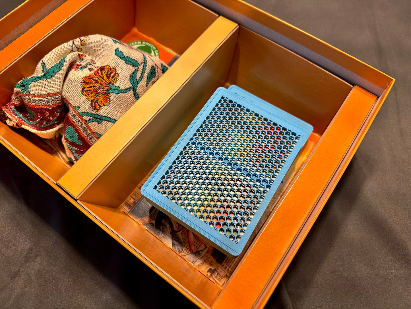 KreativLayers New York board game organizer with compartments for cards and pieces, showcasing durable construction.