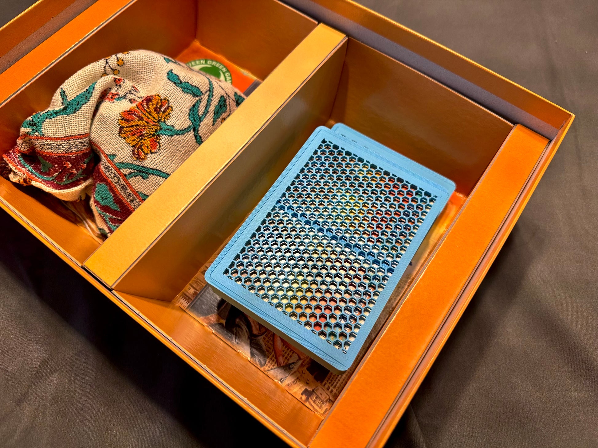 KreativLayers New York board game organizer with compartments for cards and pieces, showcasing durable construction.