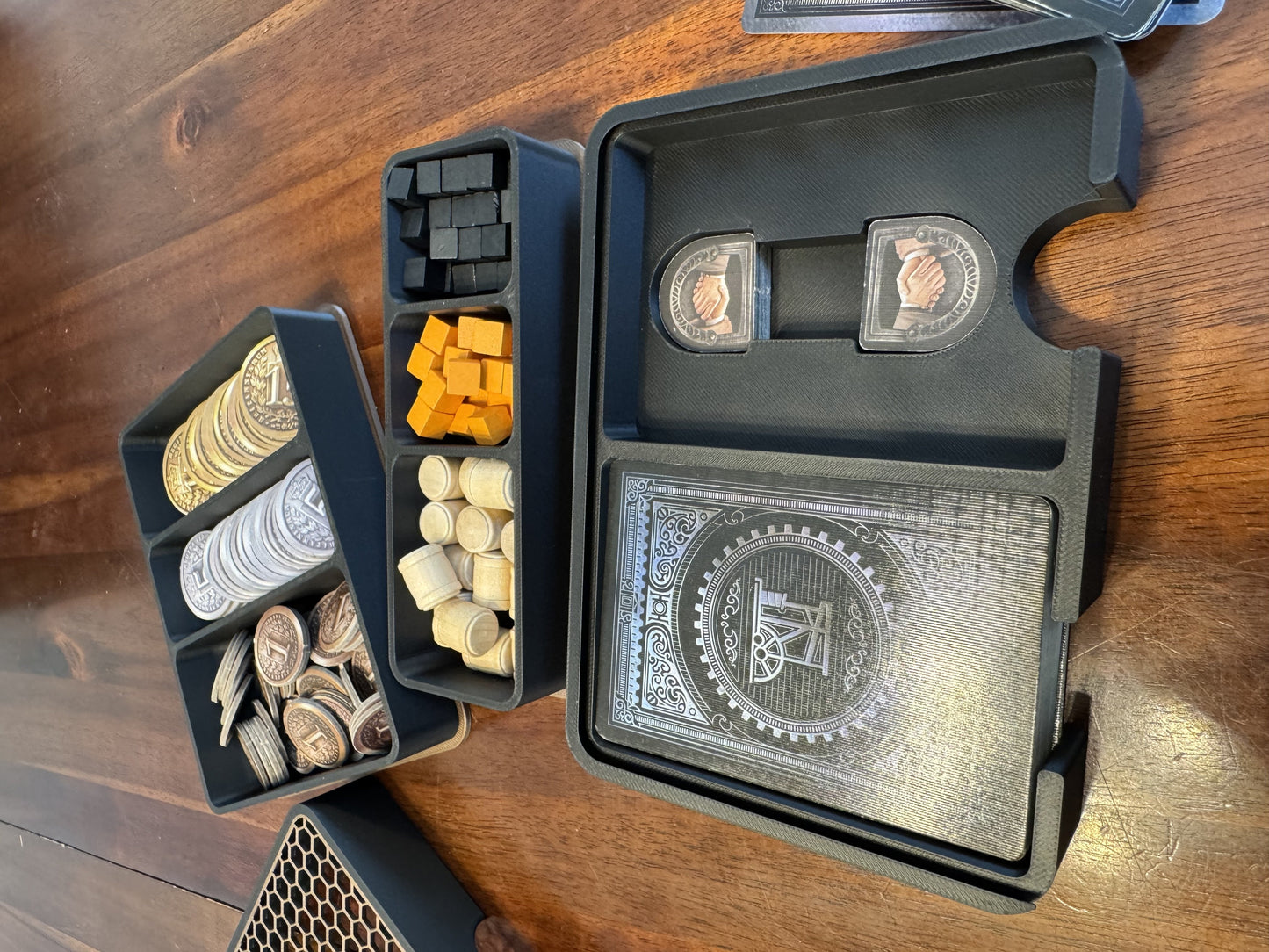 Brass Birmingham board game organizer by KreativLayers with custom compartments and a sleek design for game pieces.