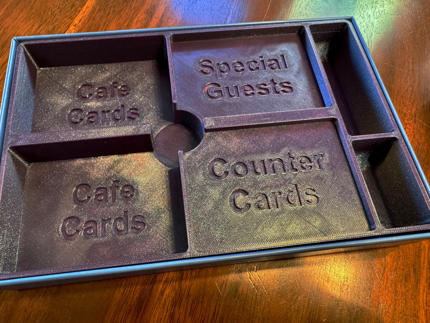 KreativLayers Cafe Baras board game organizer insert with compartments for game components and tokens.