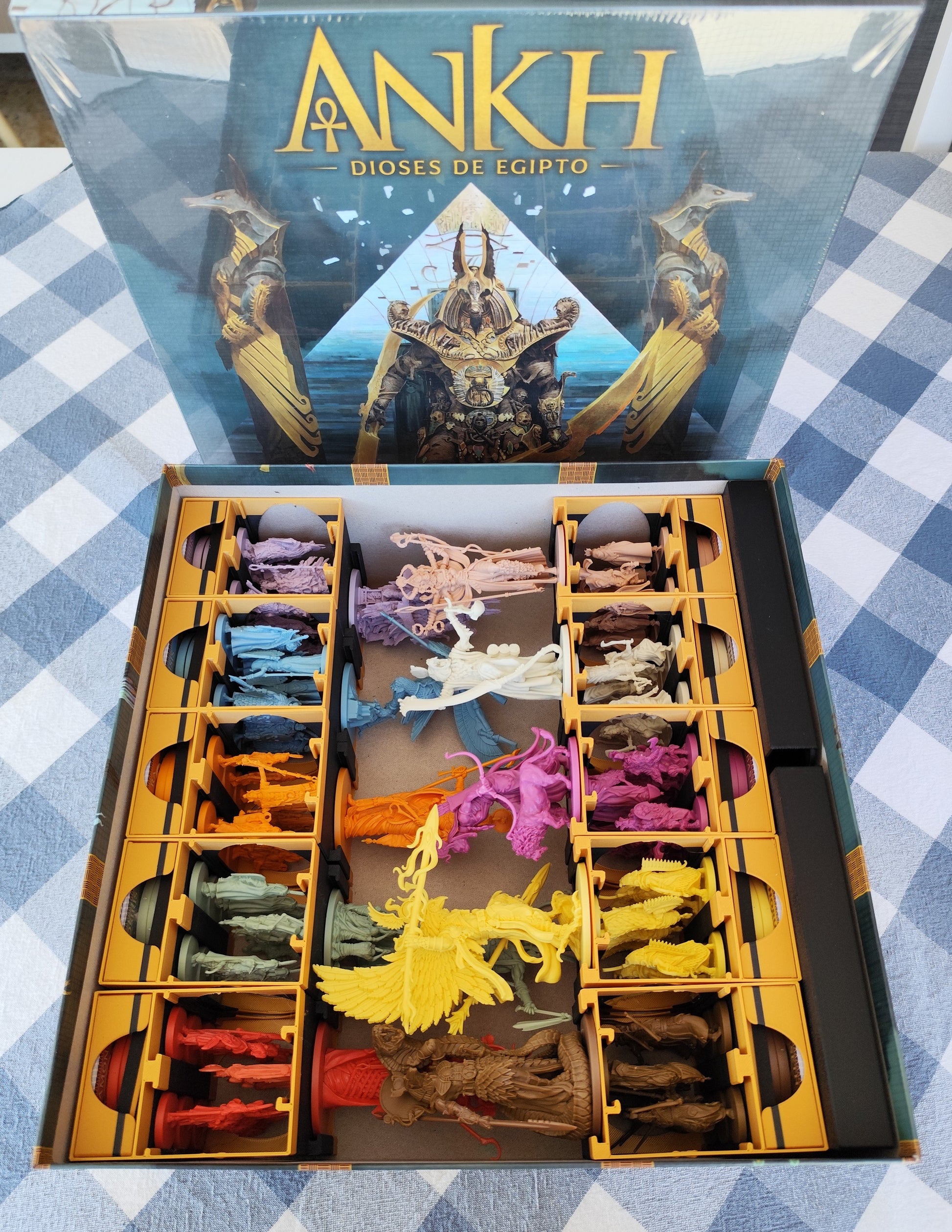 KreativLayers Ankh Gods of Egypt board game organizer with compartments for game pieces and cards, shown in a well-lit setting.