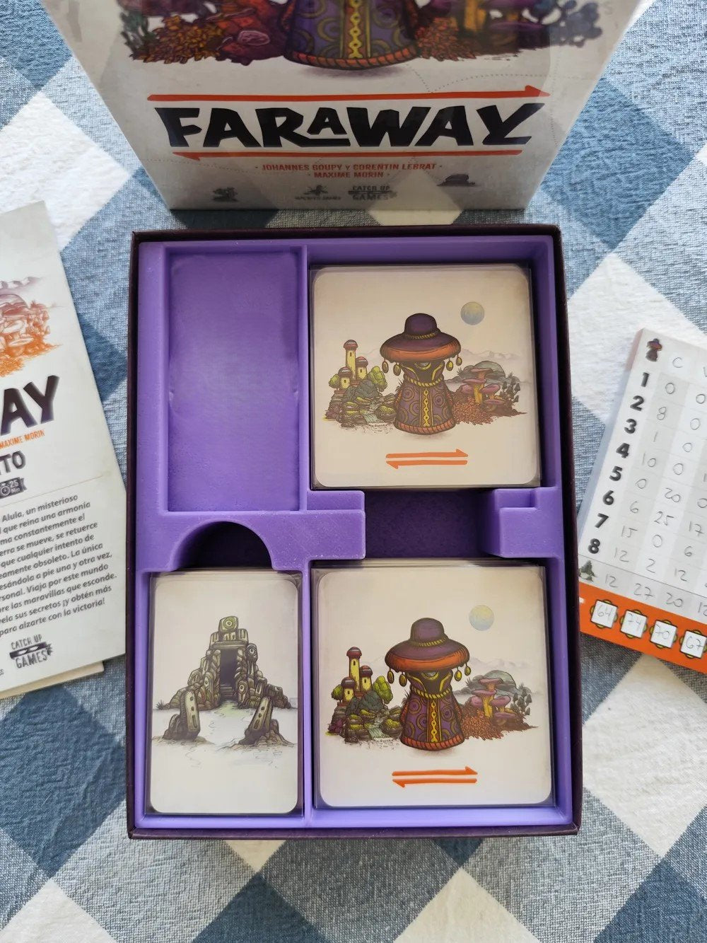 KreativLayers Faraway board game organizer with compartments and trays for easy game setup and storage.