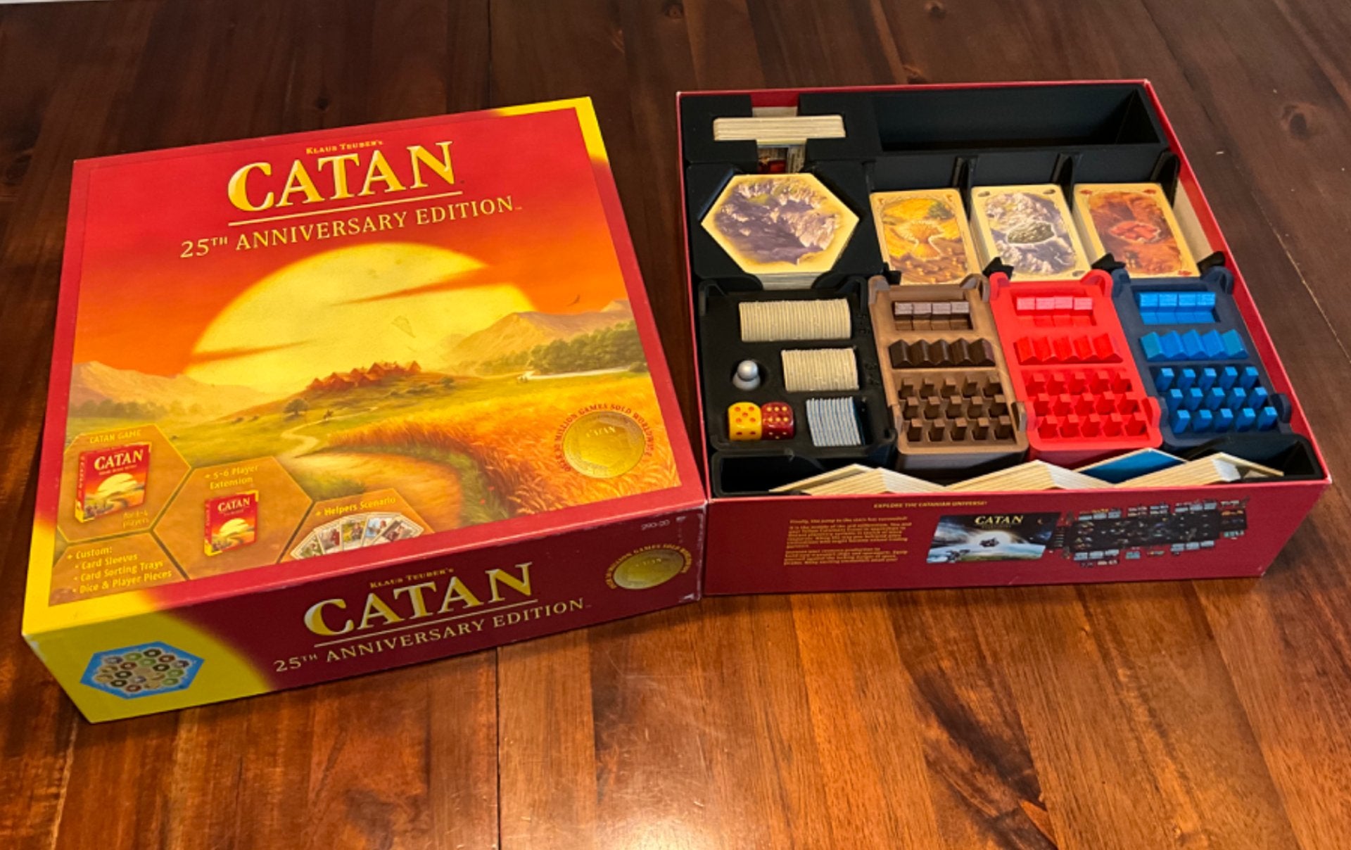 Catan 25th Anniversary Edition board game organizer by KreativLayers with compartments for game pieces and cards.