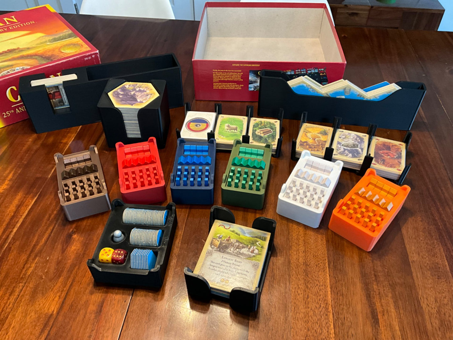 Catan 25th Anniversary Edition organizer by KreativLayers, featuring compartments for game pieces and cards.