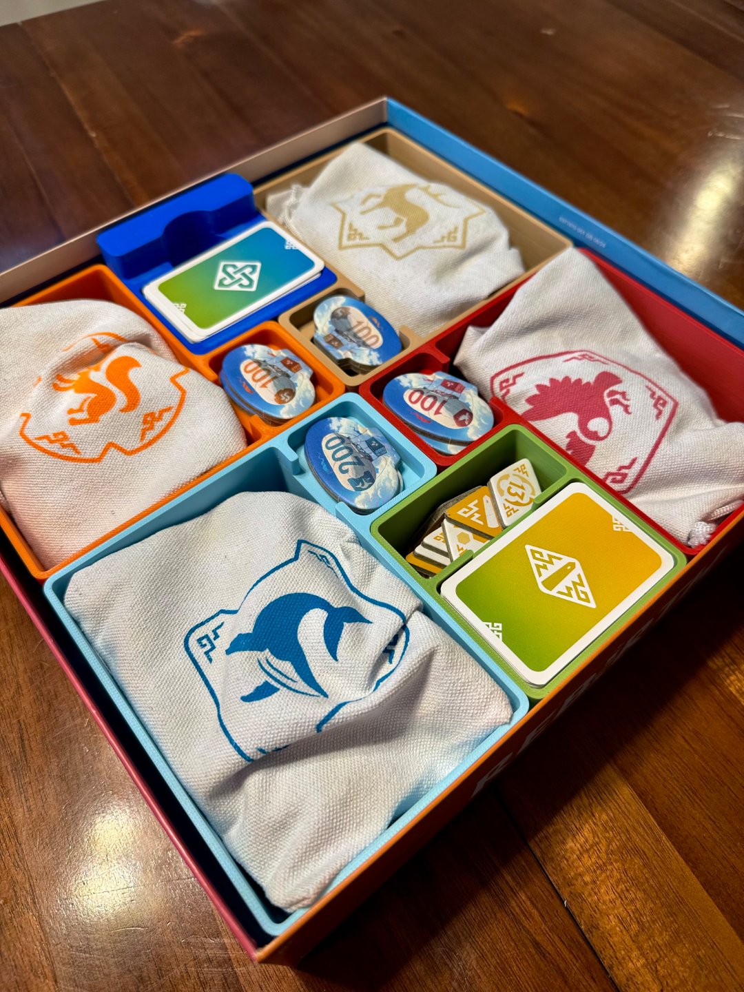 Rebirth Board Game Insert by KreativLayers, shown organized with game components and compartments for easy access.