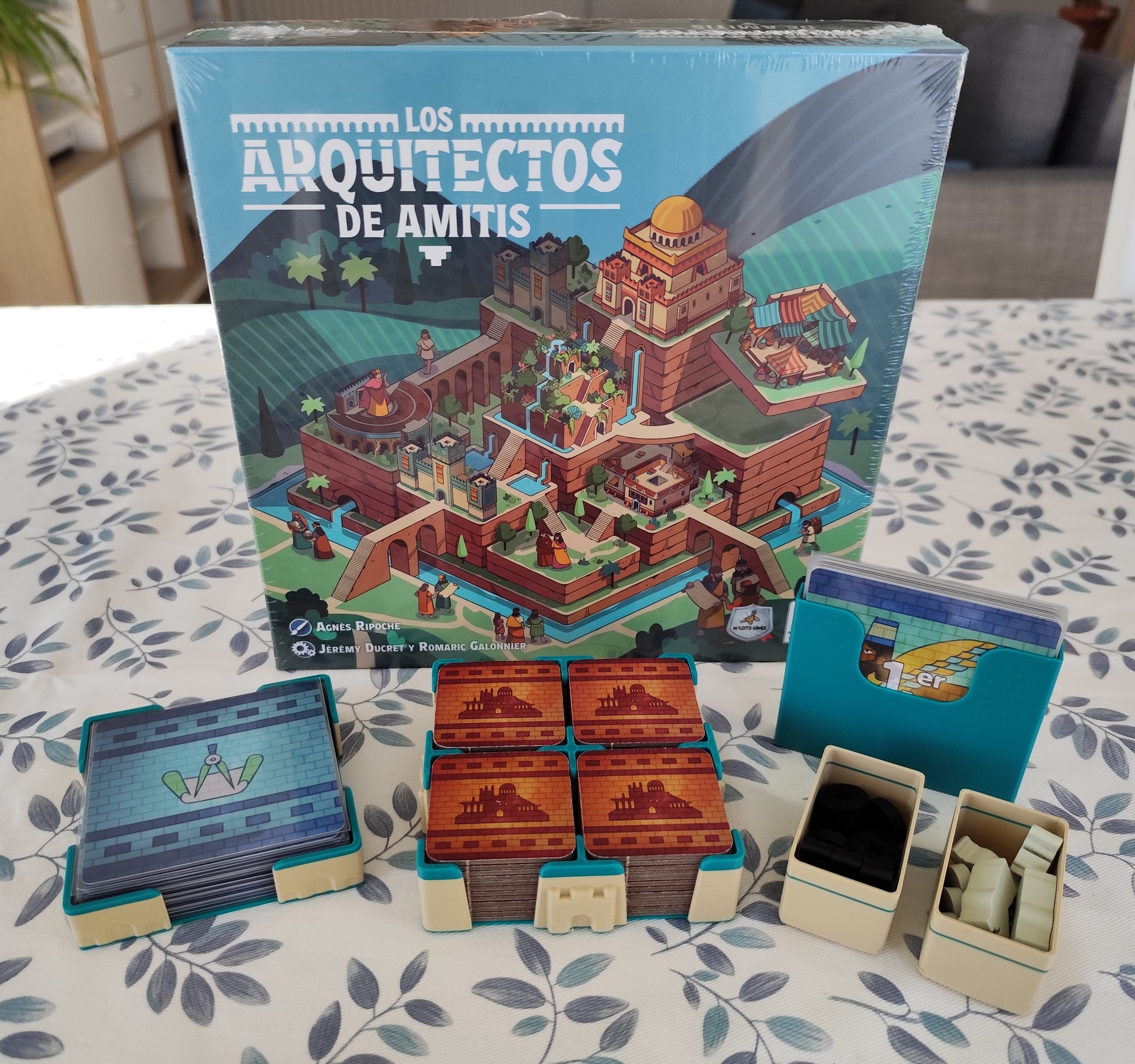 Board game organizer for The Architects of Amytis by KreativLayers, featuring compartments for game pieces and cards.