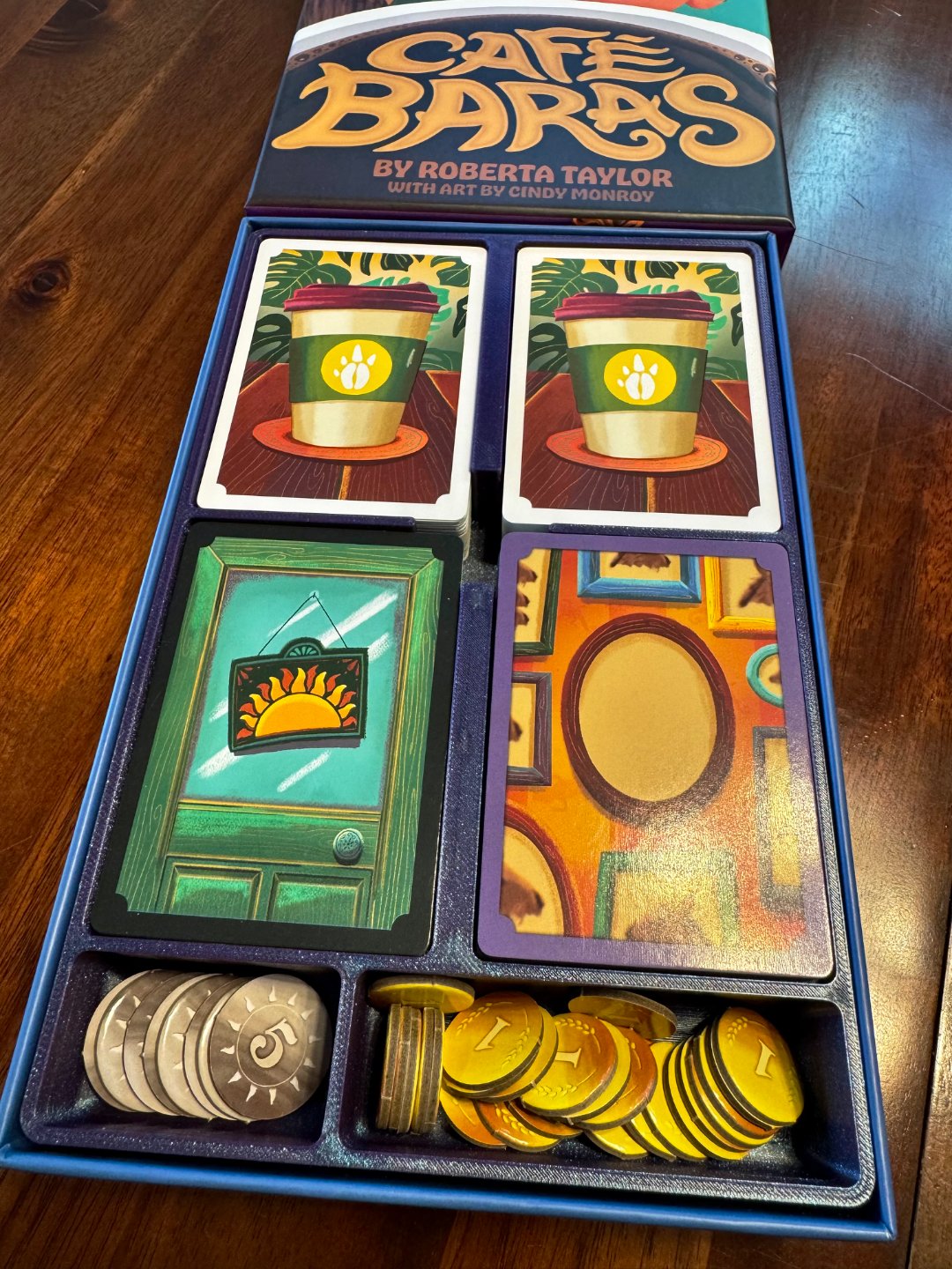 Cafe Baras game insert organizer by KreativLayers, featuring compartments for game components and cards in a sleek design.