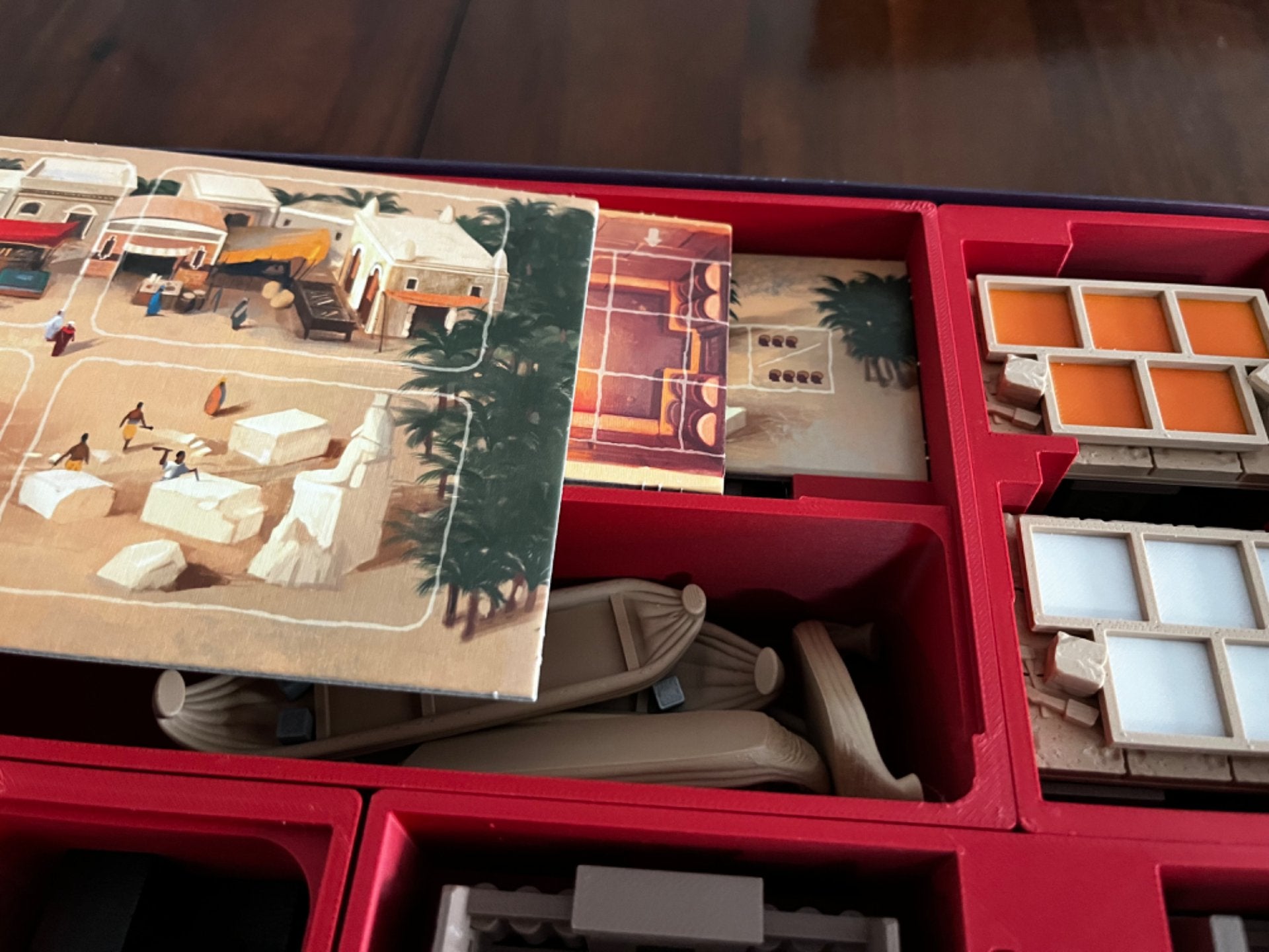 Imhotep Board Game Organizer by KreativLayers with upgraded components, featuring custom compartments and a sleek design.