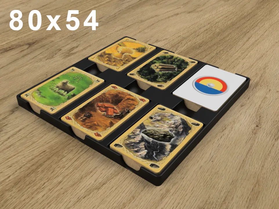 KreativLayers Catan board game organizer box with compartments for game pieces and cards, USA version, on a table.