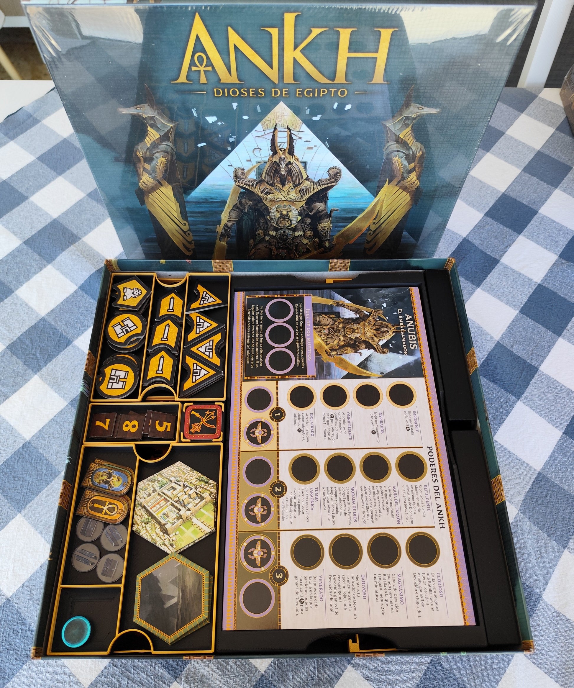 Board game organizer for Ankh Gods of Egypt by KreativLayers, featuring compartments for game pieces and cards.
