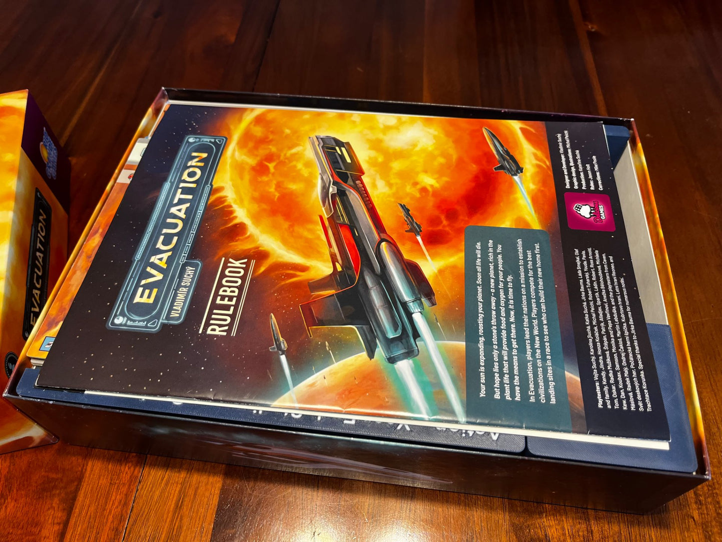 KreativLayers Evacuation Game Insert organizer with compartments for game pieces and cards, designed for easy storage.