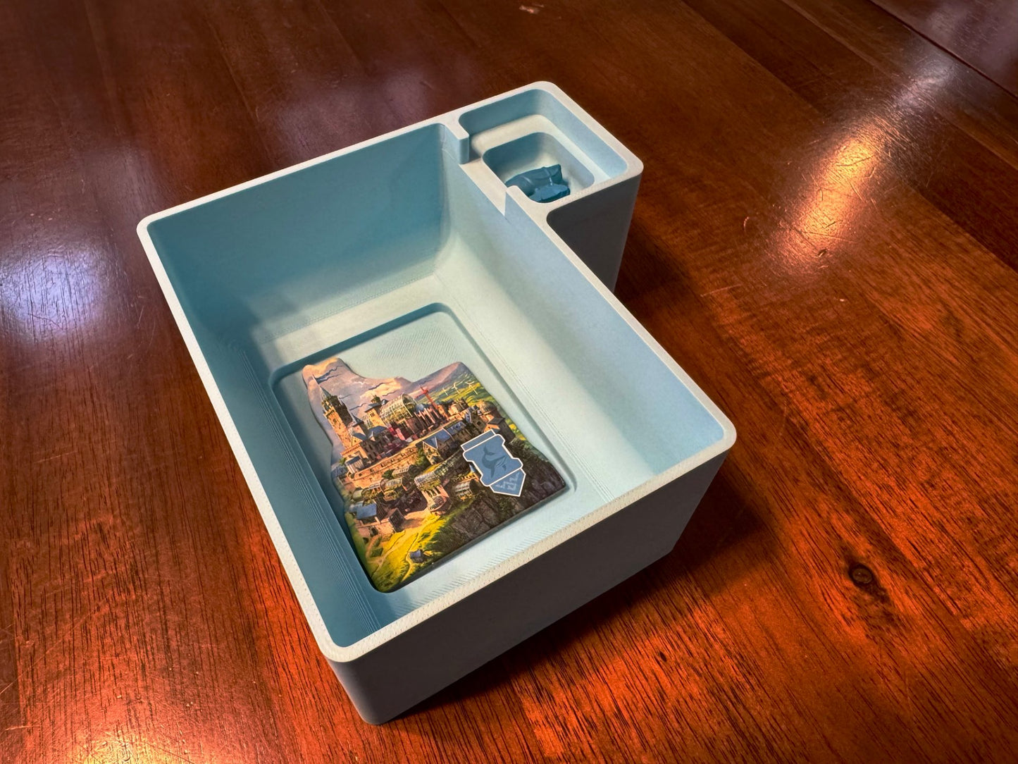 Rebirth Board Game Insert by KreativLayers, featuring compartments for game pieces and cards in a wooden organizer.
