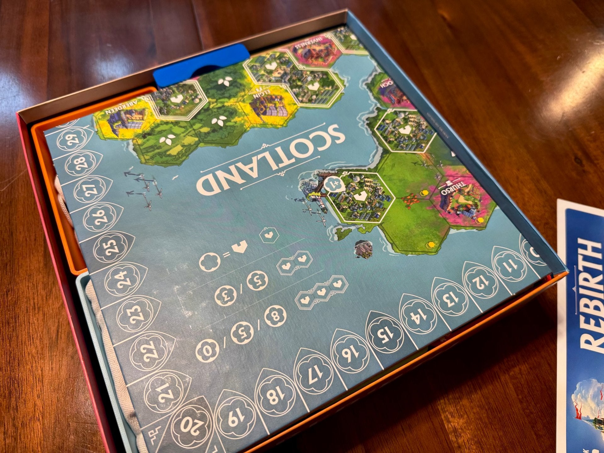 Rebirth Board Game Insert by KreativLayers, featuring compartments for organized game pieces and cards.