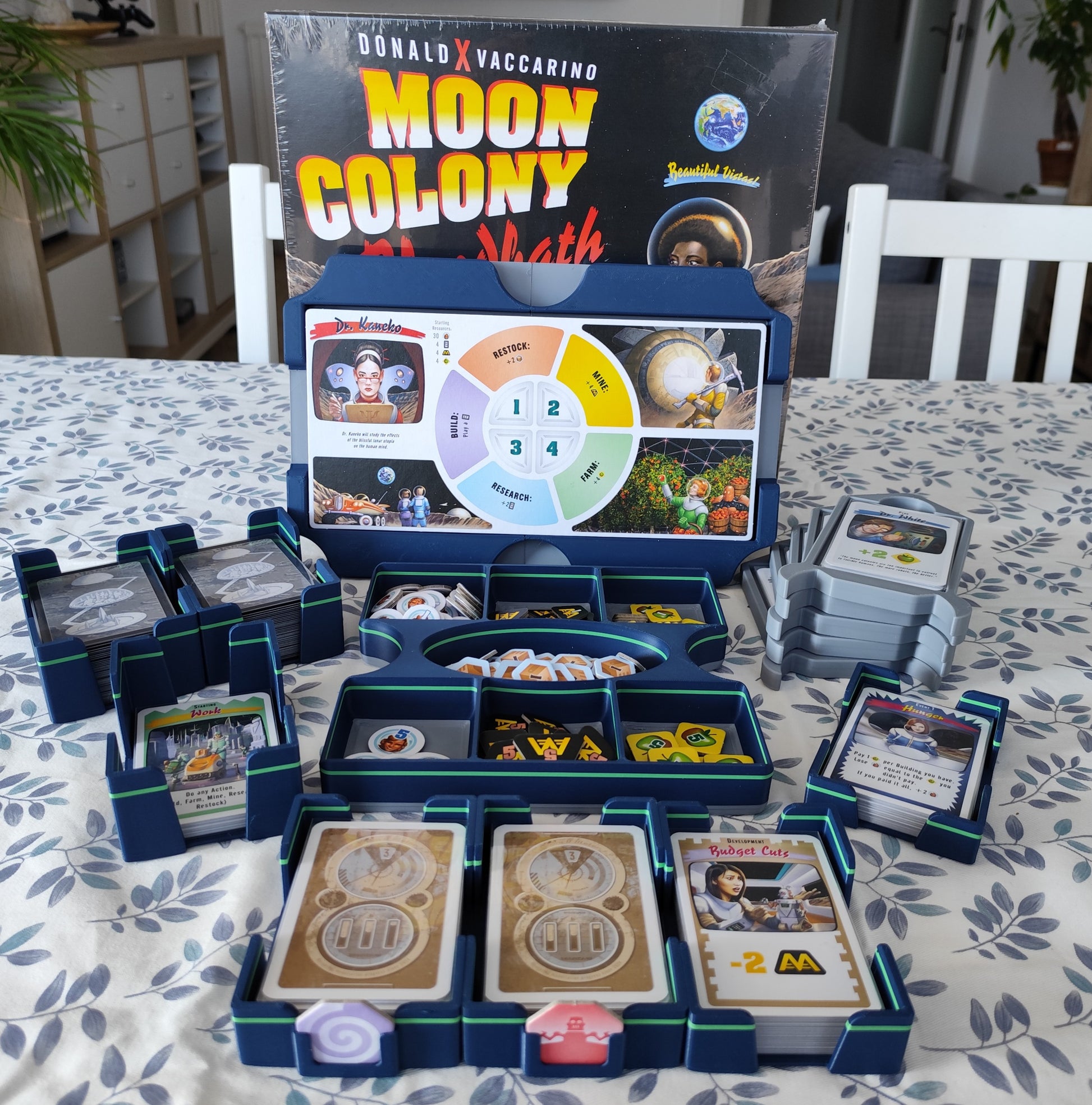 Moon Colony Bloodbath board game organizer by KreativLayers, featuring compartments for game components and cards.