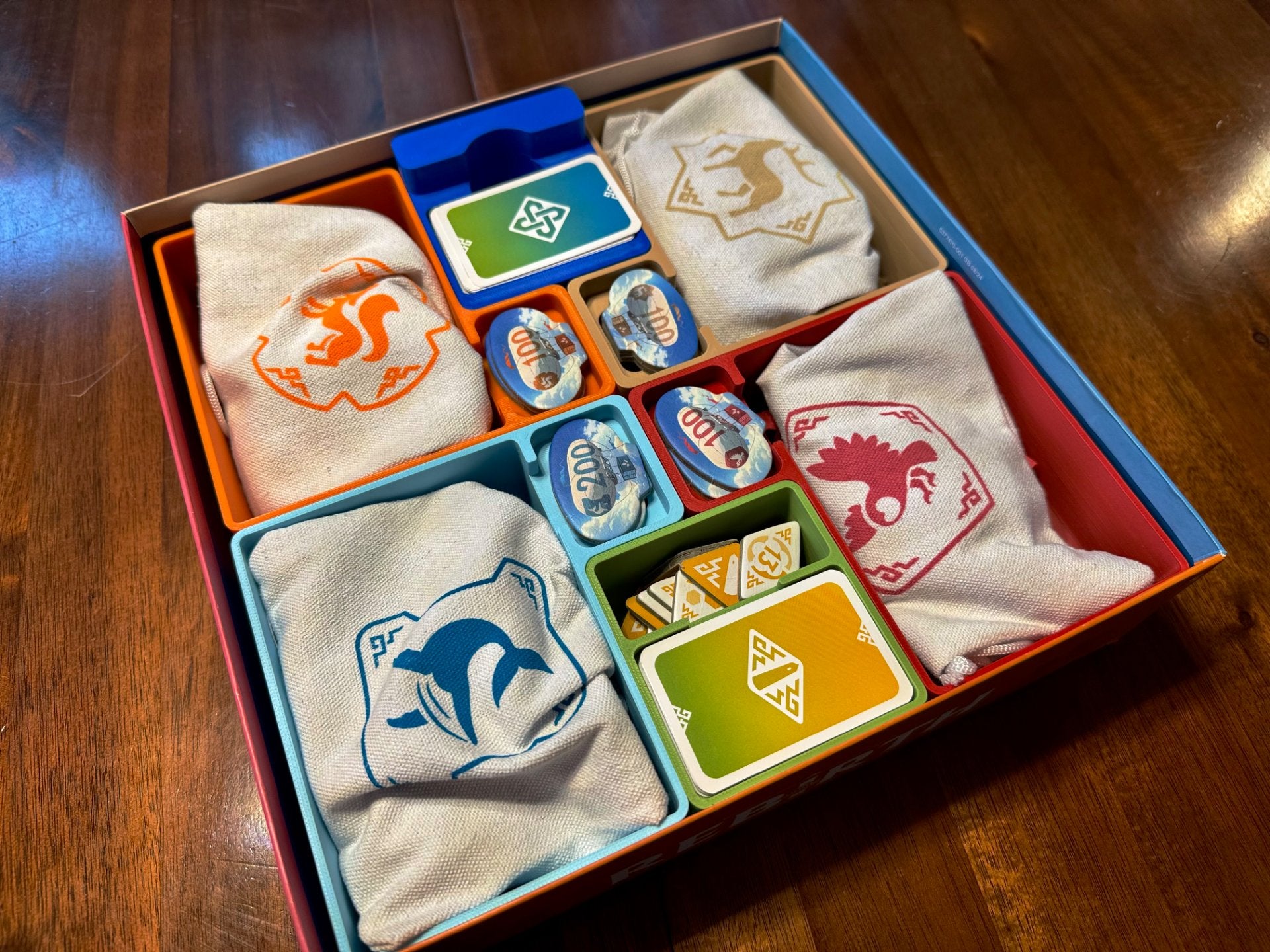 Rebirth Board Game Insert by KreativLayers, featuring custom compartments for game pieces and cards in a sleek design.