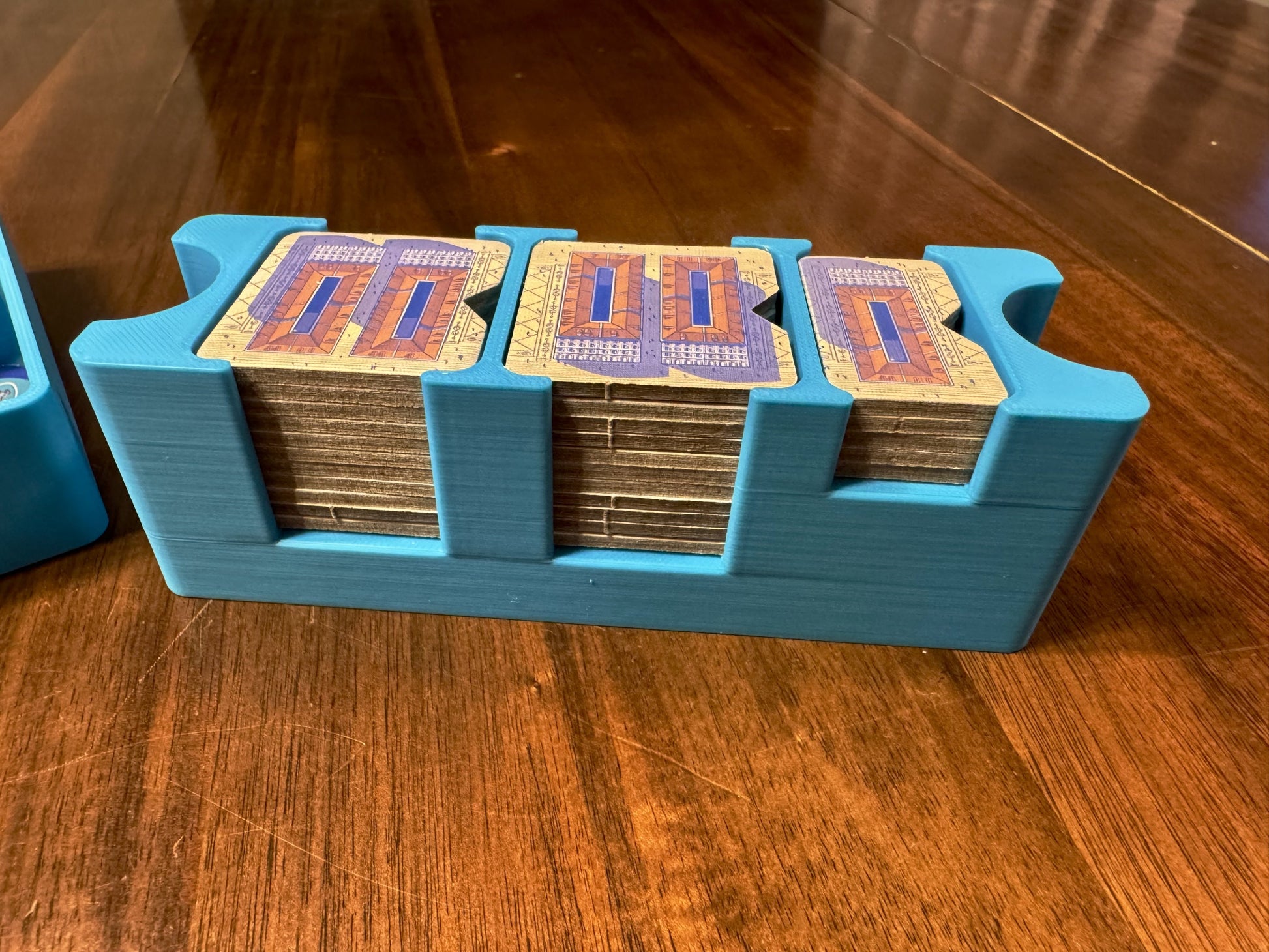 Lisboa Deluxe Board Game Organizers by KreativLayers, featuring custom compartments for game components and easy access.