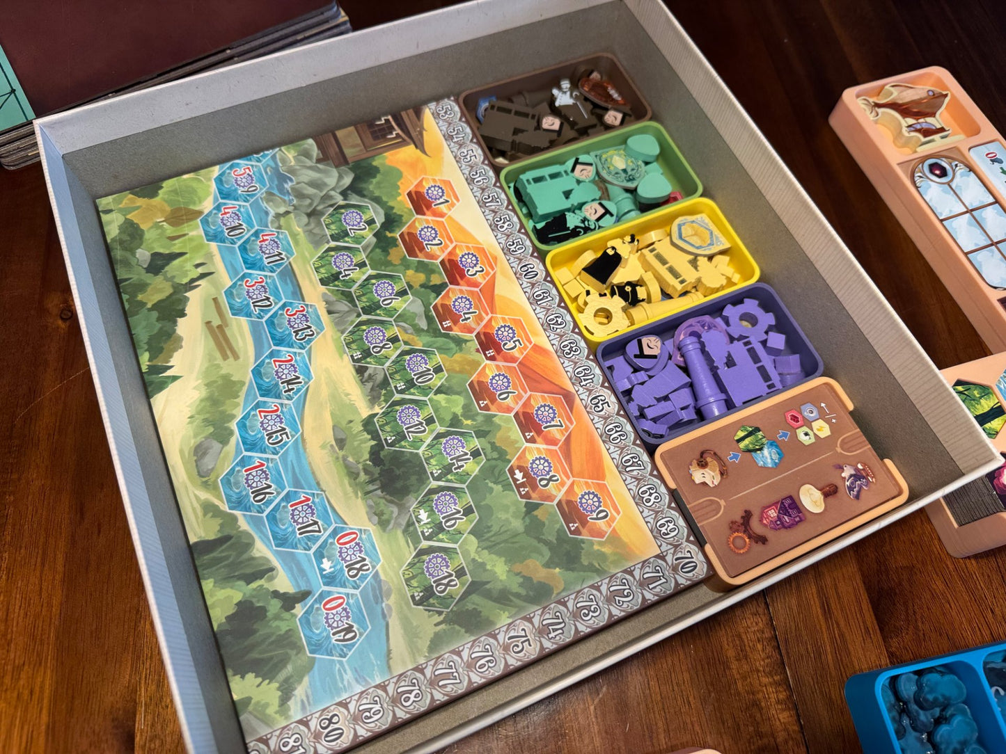 Daitoshi Insert by KreativLayers, a board game organizer with compartments for game pieces and cards, without a lid.