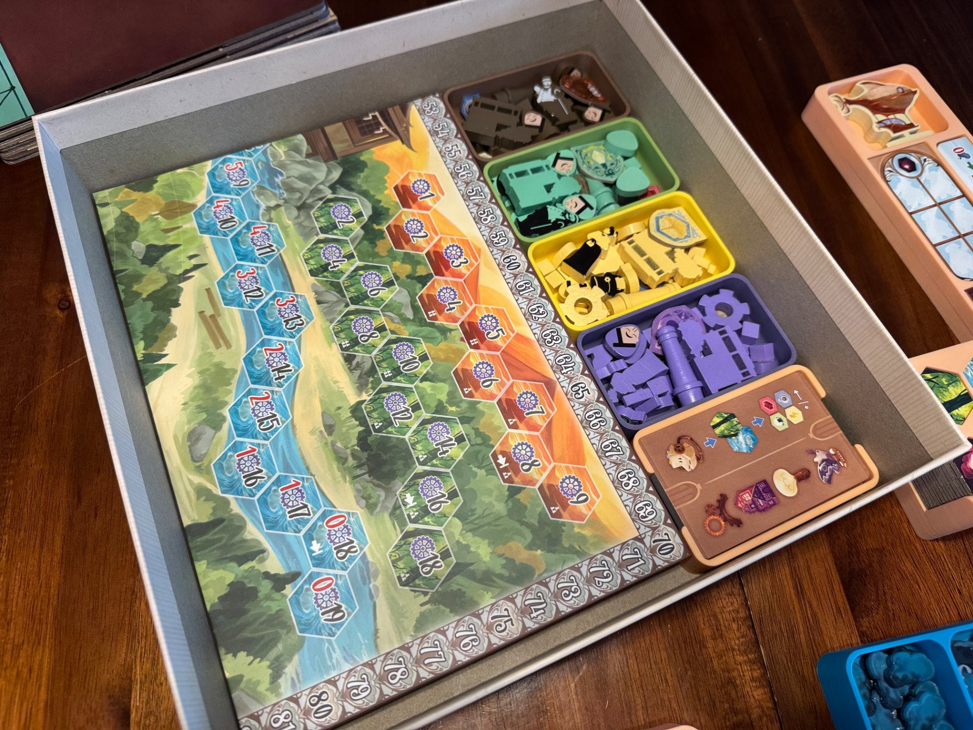 Daitoshi Insert by KreativLayers, a board game organizer with compartments for game pieces and cards, without a lid.