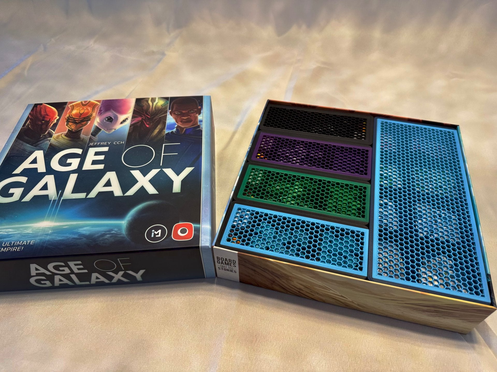 KreativLayers Age of Galaxy Second Edition board game organizer with compartments for game pieces and cards.