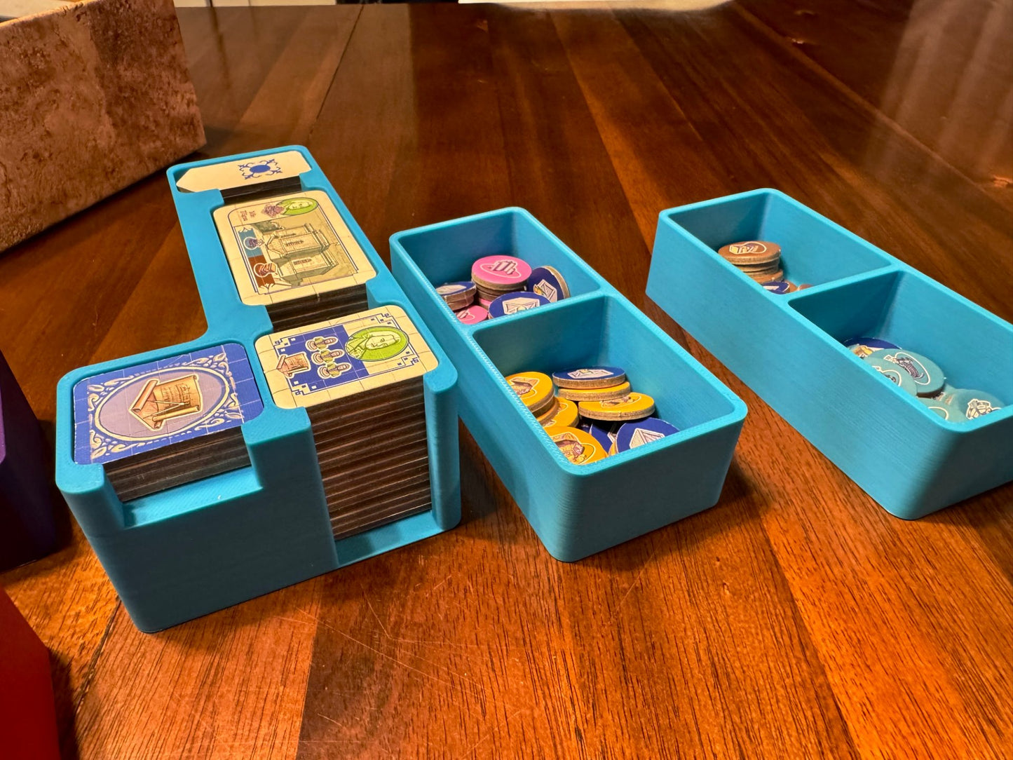 Lisboa Deluxe Board Game Organizer by KreativLayers with multiple compartments for game pieces and cards.