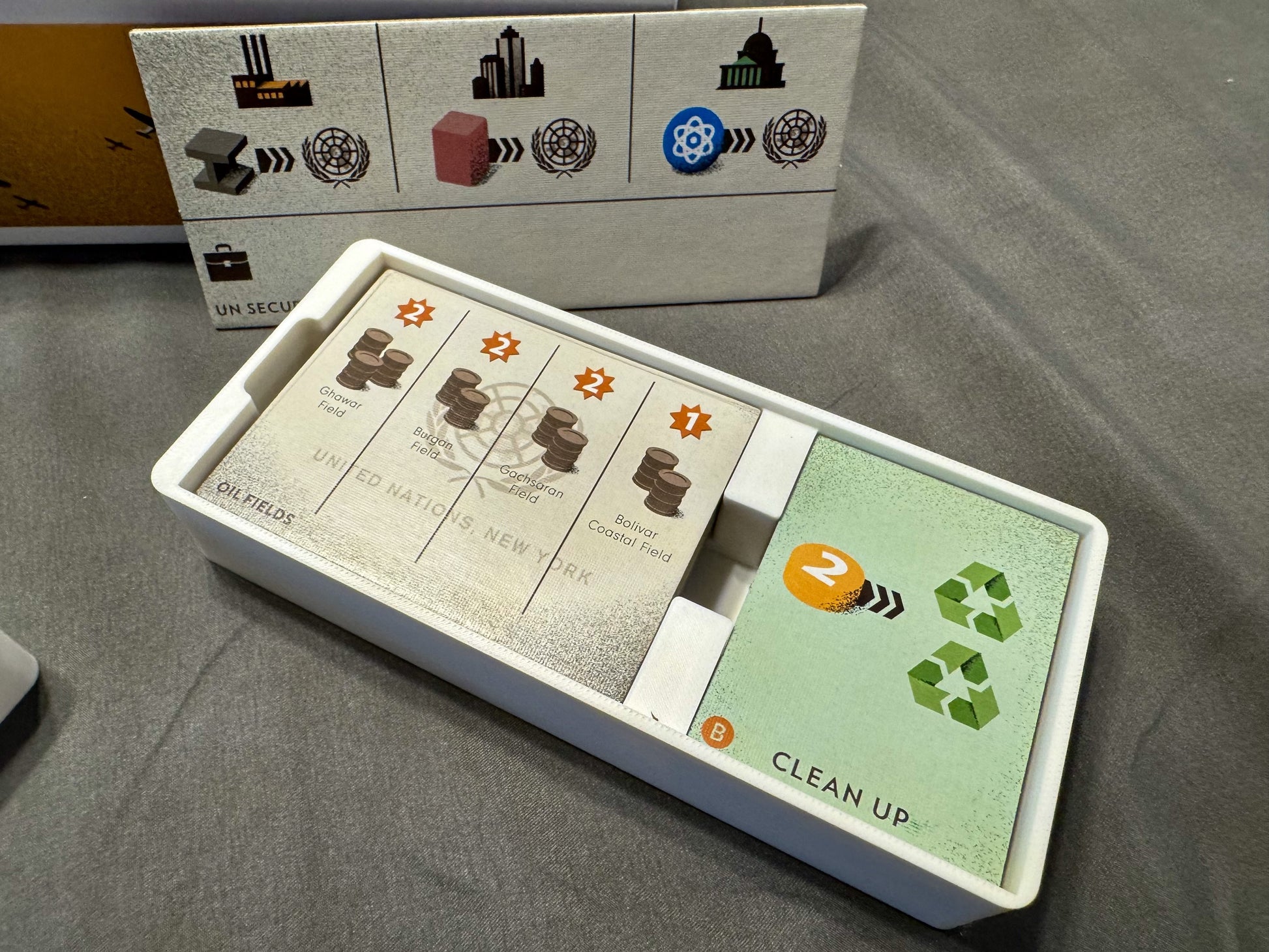 Manhattan Project Energy Empire organizer by KreativLayers, featuring compartments for game pieces and cards.