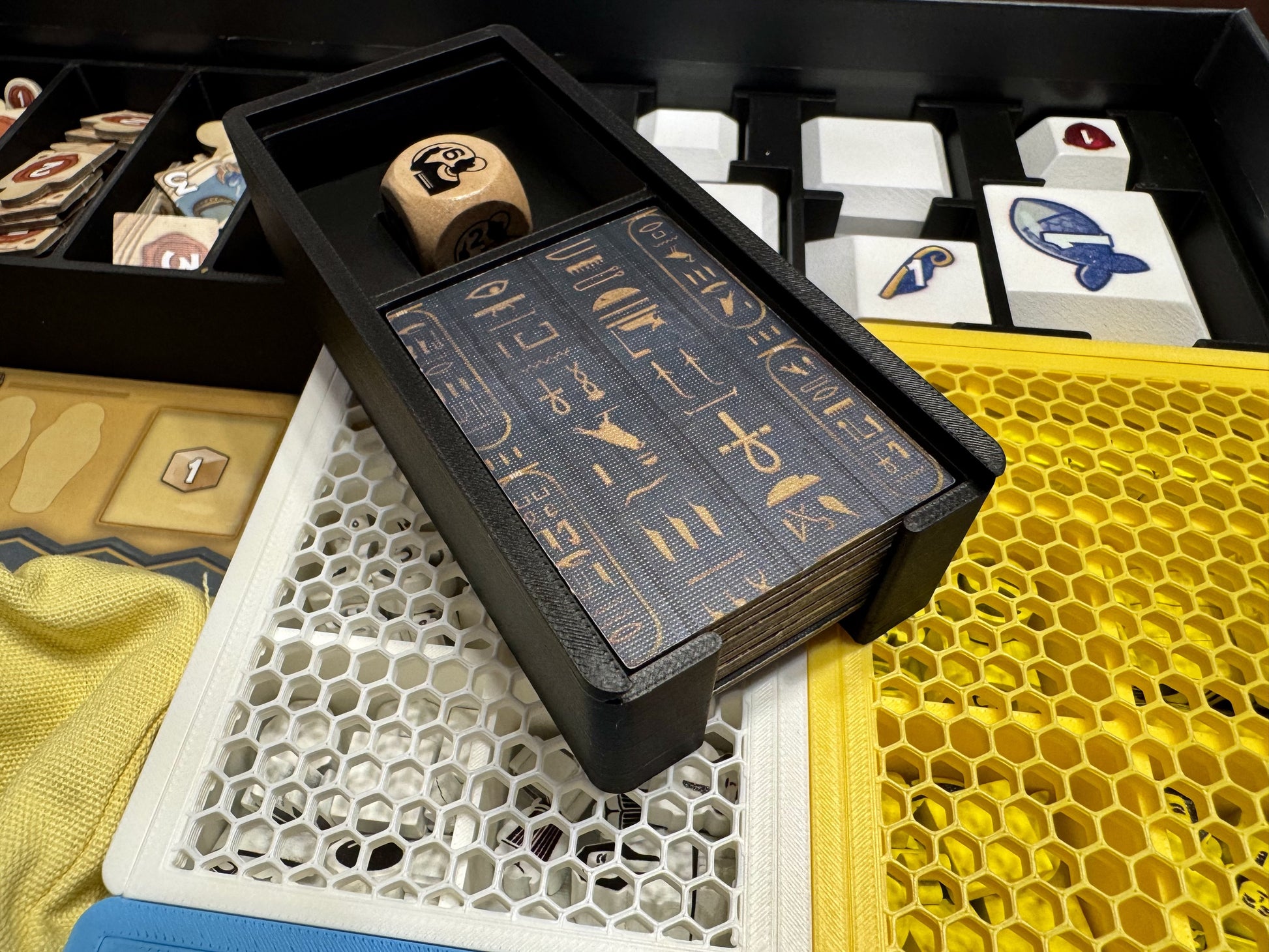 Men-Nefer board game organizer by KreativLayers, featuring custom compartments for game components and cards.