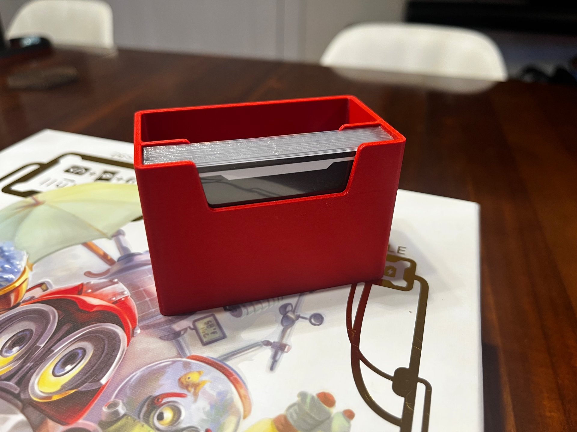 KreativLayers Raising Robots Deluxe Organizer for board game, featuring compartments for cards, tokens, and game pieces.