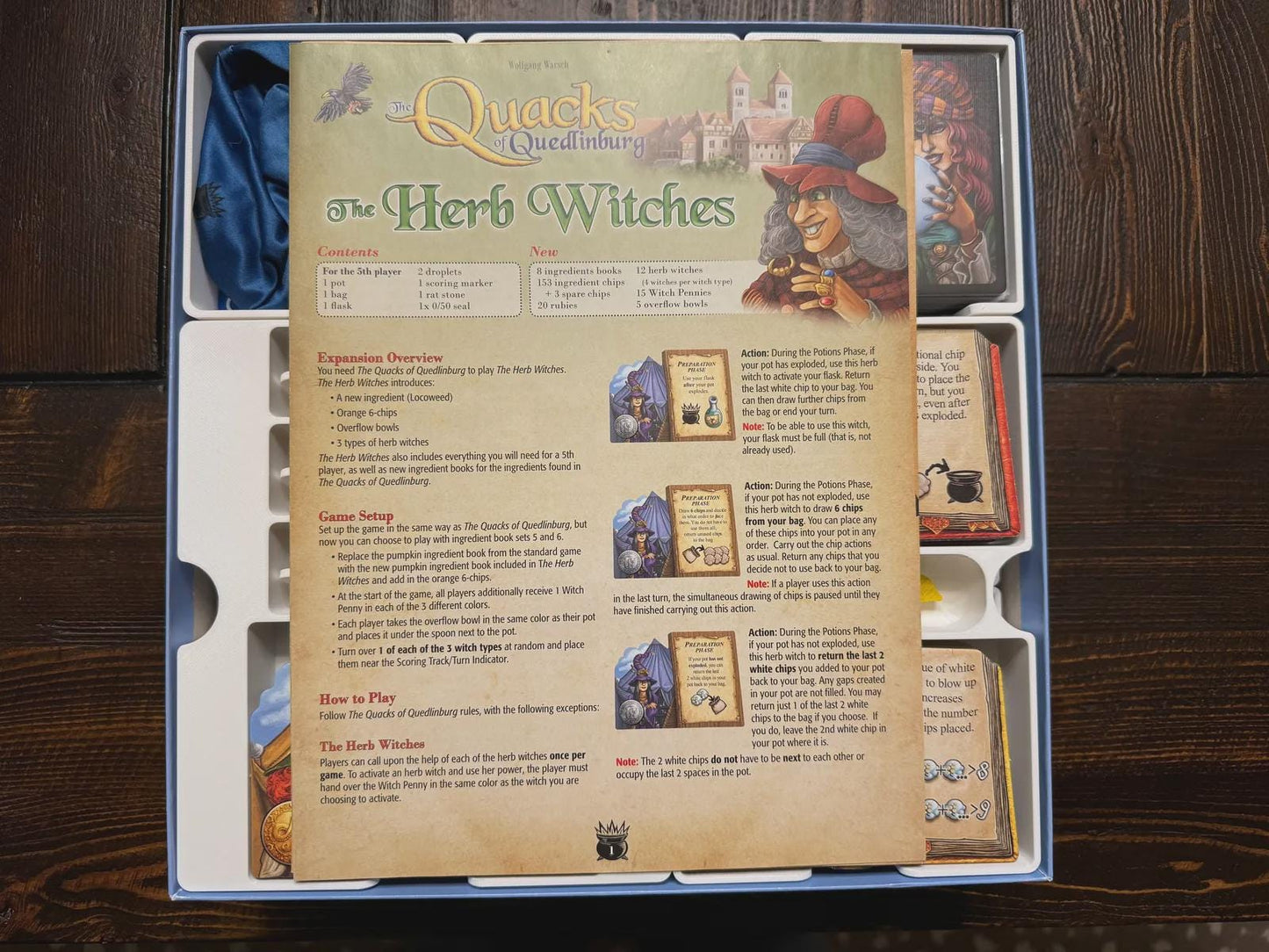 Quacks of Quedlinburg board game insert with Herb Witches expansion and organized components.