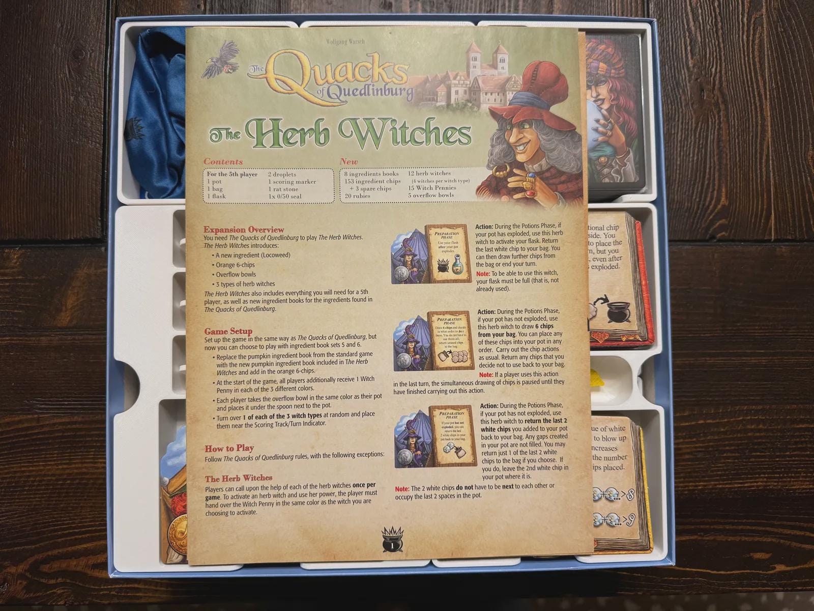 Quacks of Quedlinburg board game insert with Herb Witches expansion and organized components.