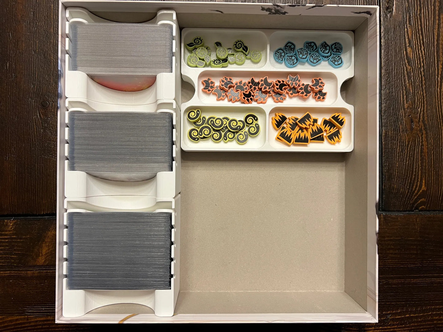 Board game organizer with card trays and token compartments, 3D printed for tabletop storage