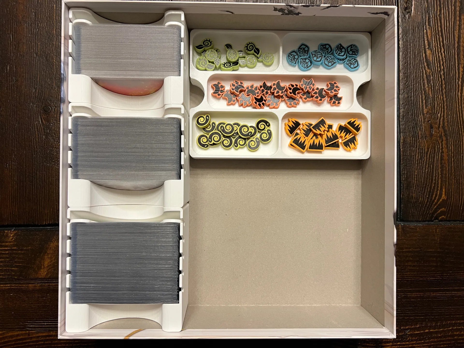 Board game organizer with card trays and token compartments, 3D printed for tabletop storage
