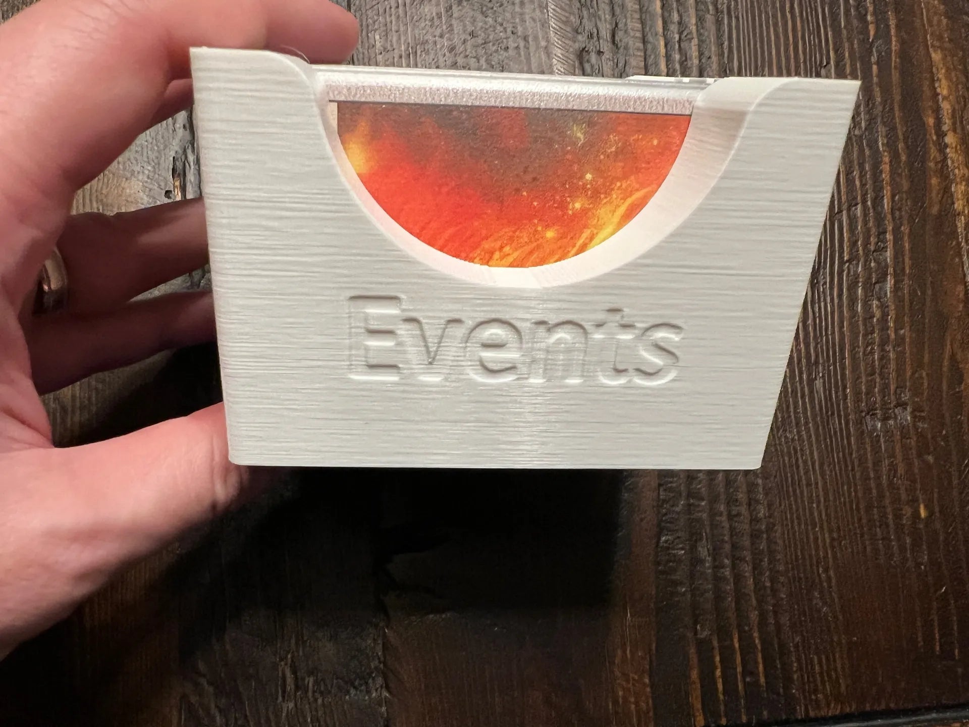 3D printed board game card organizer labeled 'Events' by KreativLayers on wooden table