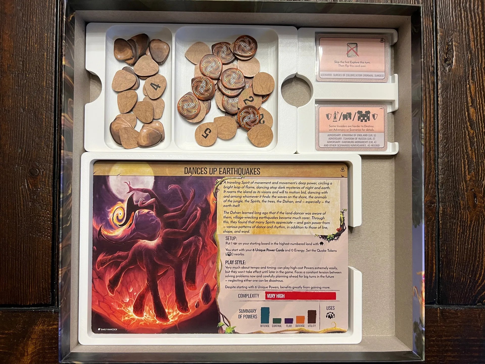 Board game organizer tray from KreativLayers with tokens, cards, and Dances Up Earthquakes board.