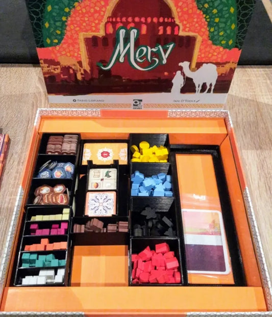 KreativLayers Merv Heart of the Silk Road board game organizer with compartments for game pieces and cards on a large display image.